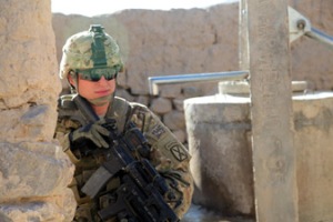 A U.S. soldier wearing an ACH helmet and Revision Sawfly Eyewear provides security in the village of Dahanar, Wardak province in Afghanistan. Photo courtesy U.S. Army.